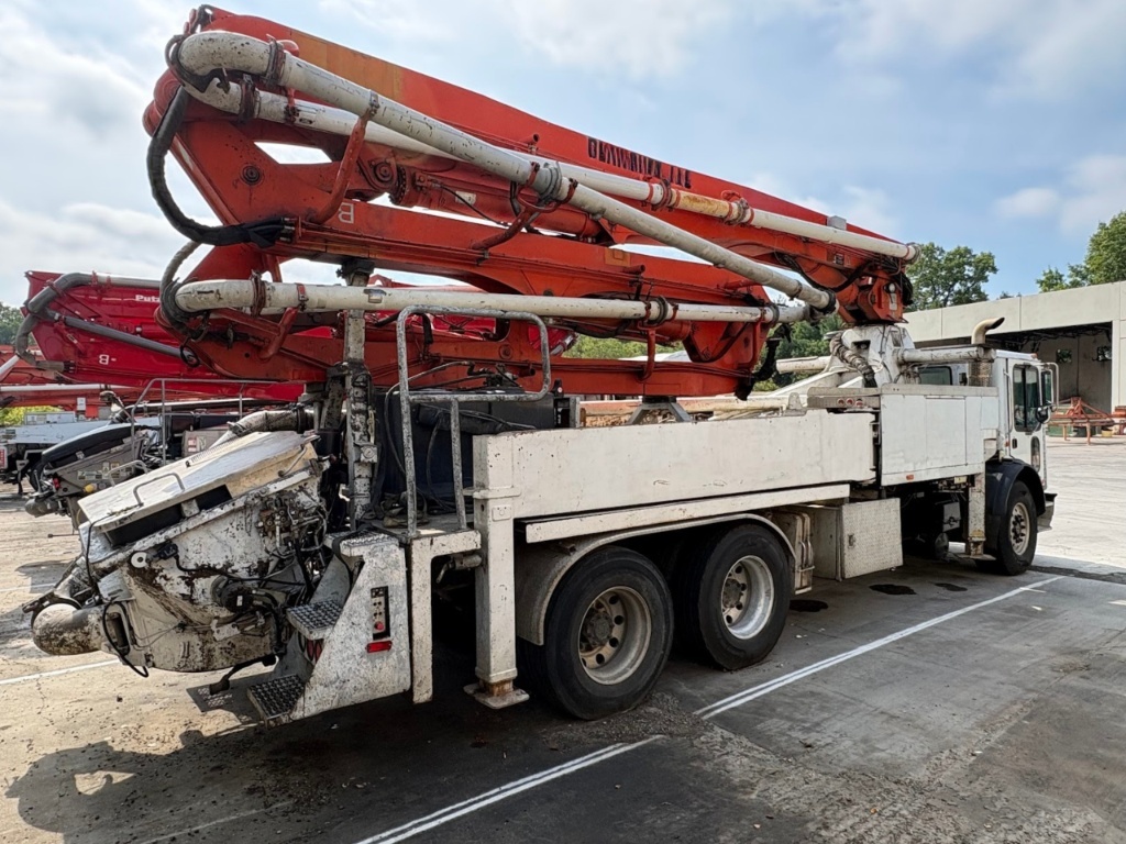 Bomba de concreto Putzmeister BSF31-5.16H 2004 — pluma Z de 31 m sobre Mack MR688S - fotografia 7