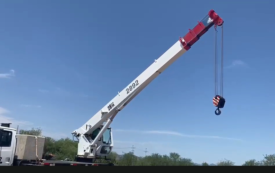 Grúa Titán Manitex M2892S 1999 – 28 Ton sobre Sterling LT7501 - fotografia 8
