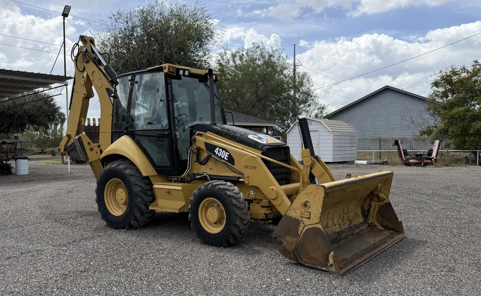 Retroexcavadora Caterpillar 430E 2010 4x4 con cabina, brazo extensible y kit para martillo - fotografia 16