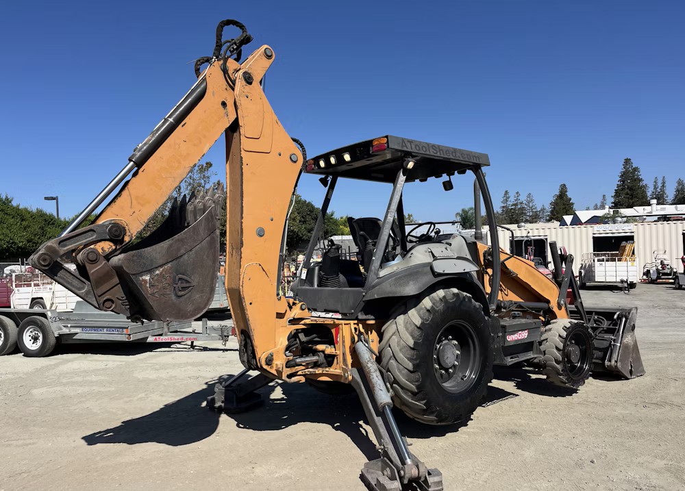 Vista trasera de retroexcavadora CASE 580N EP con brazo extensible
