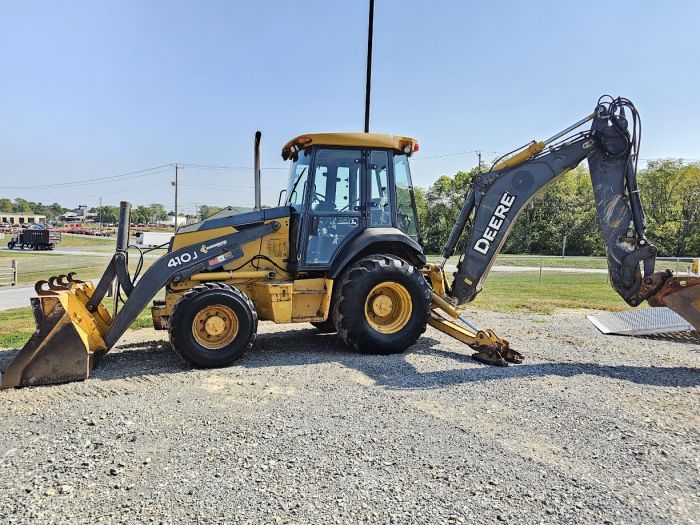 cómo se opera una retroexcavadora John Deere 410J