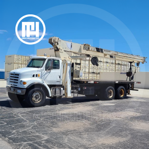Grúa Titán 2002 National 9103A 26 toneladas 103 ft en camión Sterling L7500